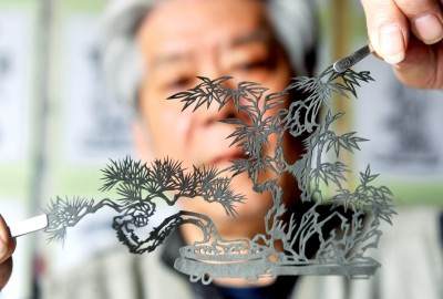 我的创业之路剪纸盆景 百图昨亮相